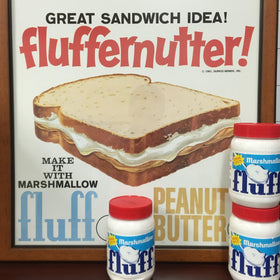 Marshmallow Fluff jar with spoon inviting quick tasting.
