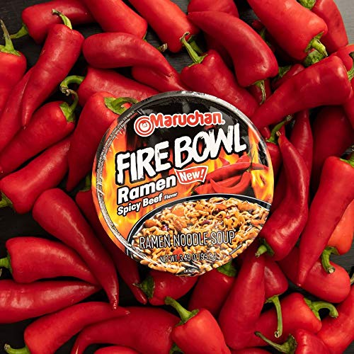 Maruchan Fire Bowl beef broth closeup emphasizes rich aroma and chili warmth.