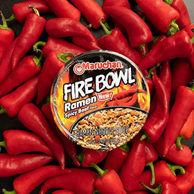 Maruchan Fire Bowl beef broth closeup emphasizes rich aroma and chili warmth.