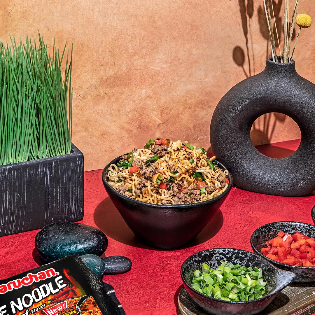 Maruchan Fire Spicy Beef noodle-closeup emphasizing bold aroma and texture.
