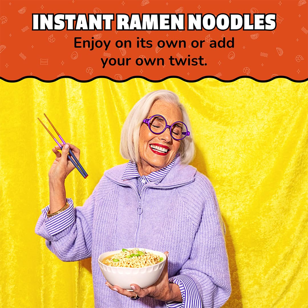 Noodles simmering in pot with Maruchan Pork Flavor broth.