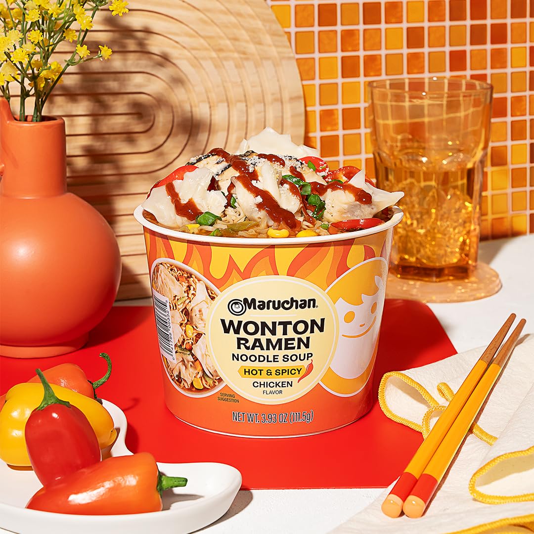 Wontons float in broth of Maruchan Wonton Ramen Bowl for savory bites.