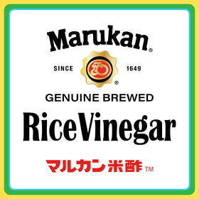 Marukan rice vinegar drizzle on seafood and veggies delivers subtle tang.