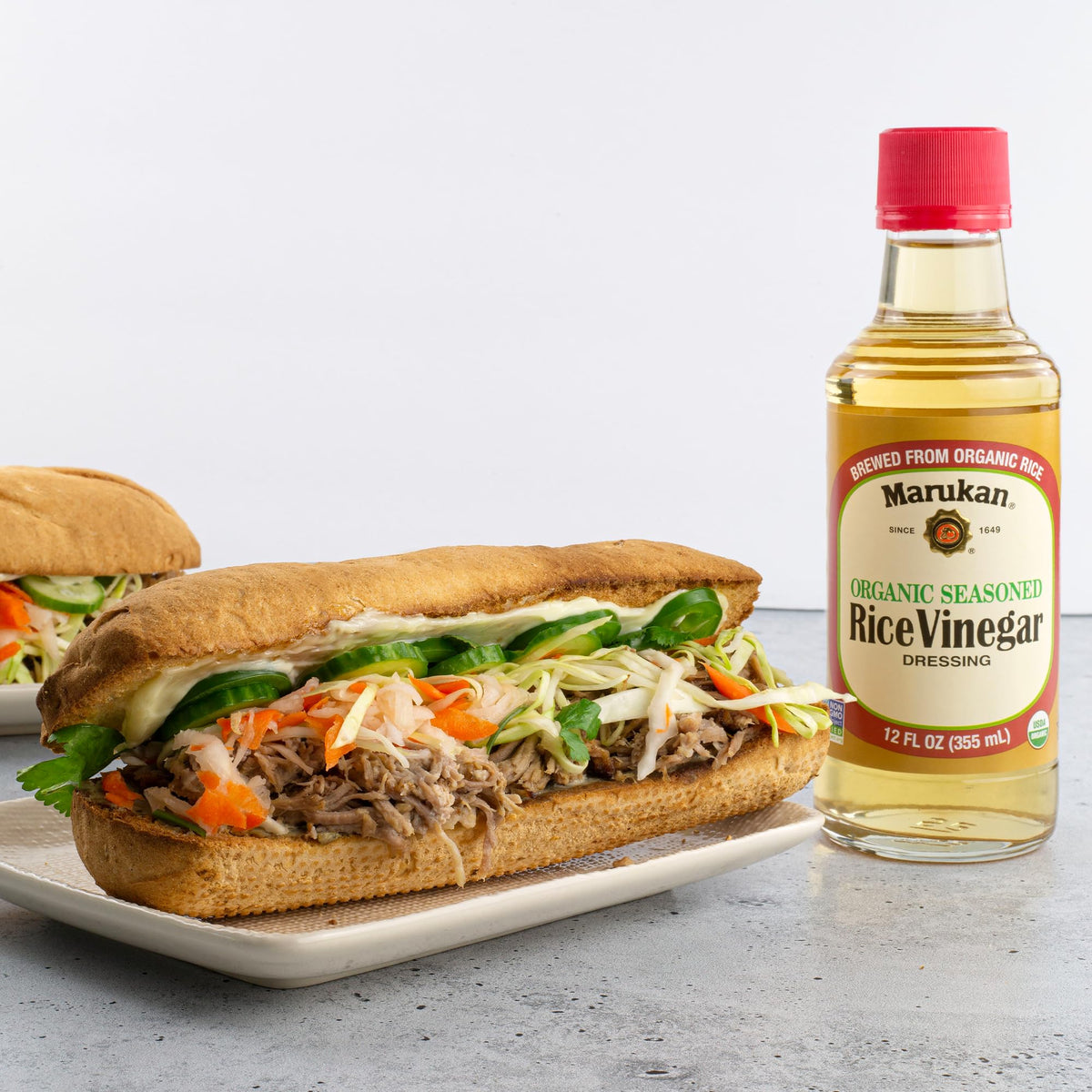 Glass bottle of Marukan Organic Rice Vinegar for easy, spill-free pouring