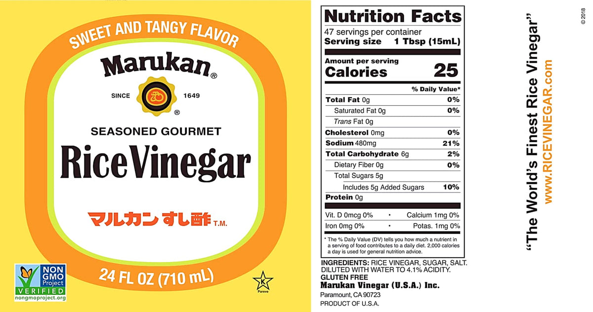 Pouring Marukan Seasoned Gourmet Rice Vinegar from bottle for dressings