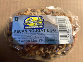 Mary Sue Pecan Nougat Egg on Easter table adds a delicious centerpiece.