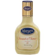 Marzetti Sweet & Sour dressing bottle enhances salads with tangy-sweet flavor.