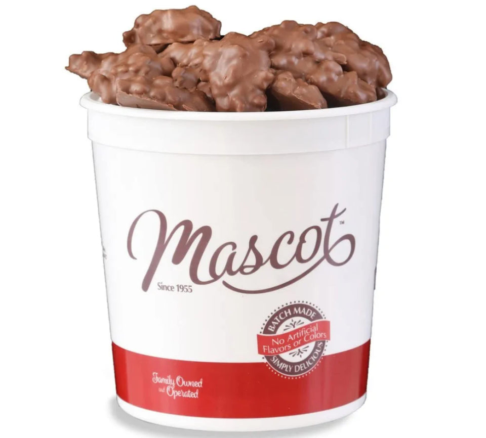 Mascot Pecan Clusters with milk chocolate, ideal for a quick snack and on-the-go moments.