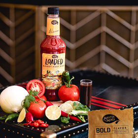 Master of Mixes Loaded Bloody Mary bottle label showcases bold flavor blend.