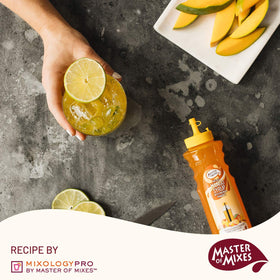Mango syrup bottle on a bar setup for Mango Daiquiri or Julip inspiration.