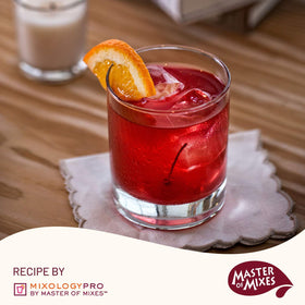Master of Mixes Old Fashioned bartender scene suggesting bar-quality drinks at home.