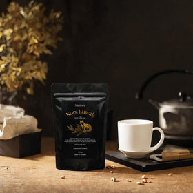 Matinée Wild Kopi Luwak beans in burlap bag evoke rustic luxury.