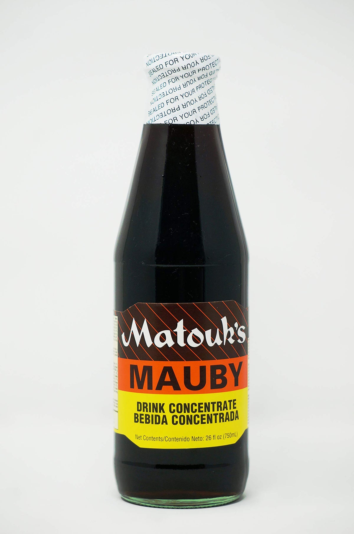 Matouk's Mauby bottle close-up with rich amber color for a refreshing classic.