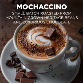 Maud's Mochaccino Cappuccino pods dispensing into a cup highlight easy, mess-free brewing.
