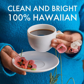 Family-run Maui Coffee Co. sign highlighting decades of care.