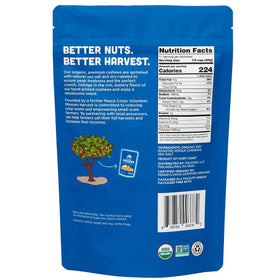 Mavuno Harvest dry roasted cashews on a wooden board, premium quality