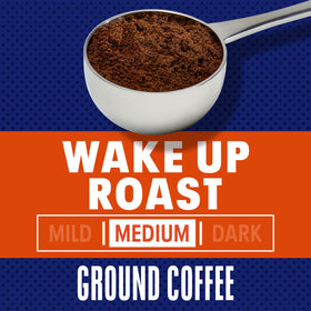 Ground Maxwell House Wake Up Roast in measuring scoop for brewing.