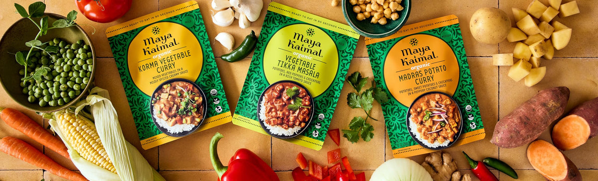 Maya Kaimal organic vegetable curry pouch ready-to-serve with colorful vegetables