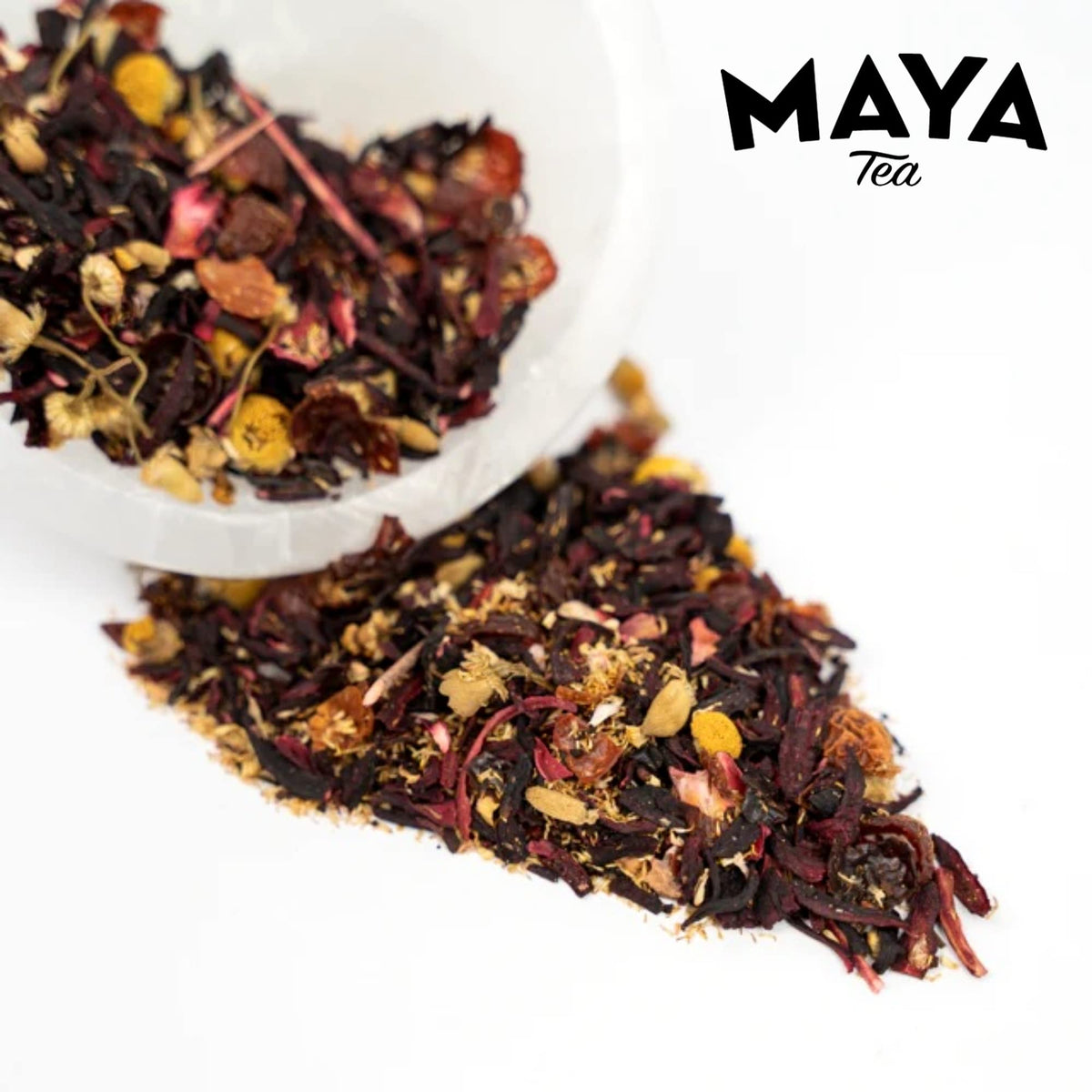 Maya Tea hibiscus-chamomile base cup, soothing aroma for relaxing moments.