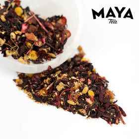 Maya Tea hibiscus-chamomile base cup, soothing aroma for relaxing moments.