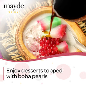 Mayde boba pearls as dessert topping on ice cream; adds color and flavor.
