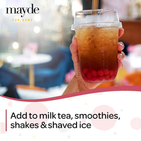 Mayde bursting boba pearls; soft texture that pops for a playful bite.