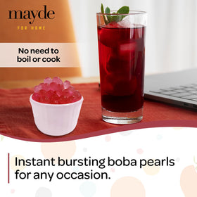 Mayde popping boba pearls on a breakfast bowl add playful fruitiness.