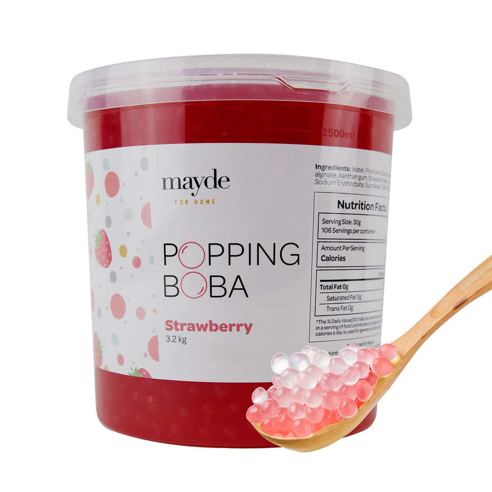 Mayde popping boba pearls strawberry burst in a glass; juicy flavor for drinks.