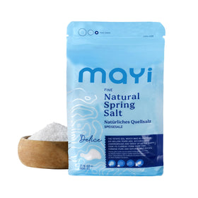 Mayi Tuz natural spring salt bottle shows mineral-rich seasoning for flavorful cooking.
