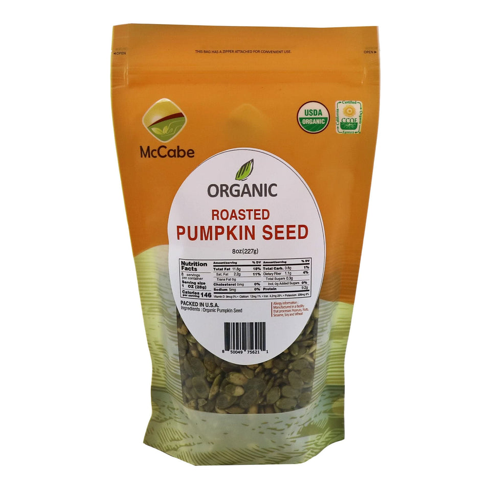 McCabe Organic Roasted Pumpkin Seeds (Unsalted) in a resealable pouch for convenient snacking.