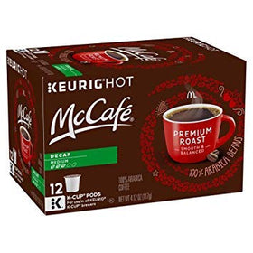 Steaming McCafé Decaf K-Cup cup delivering a smooth, caffeine-free sip.