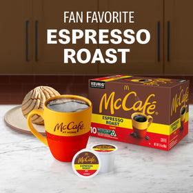 McCafe Espresso Roast Arabica beans close-up signaling premium flavor.