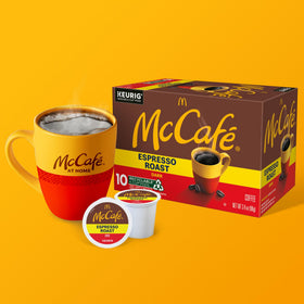McCafe Espresso Roast K-Cup pods on countertop ready for indulgent mornings.