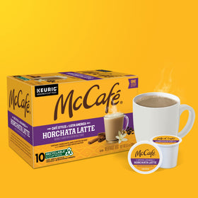 Countertop setup showing McCafé Horchata Latte with cup