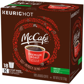 Brewing McCafé Premium Roast Decaf K-Cup into a cup with a smooth pour