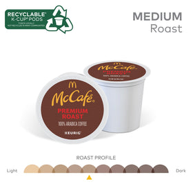 Steam rises from a McCafé Premium Roast mug, highlighting aroma and smooth finish.
