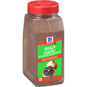 McCormick Black Garlic Powder Seasoning bottle close-up adds savory umami to steak
