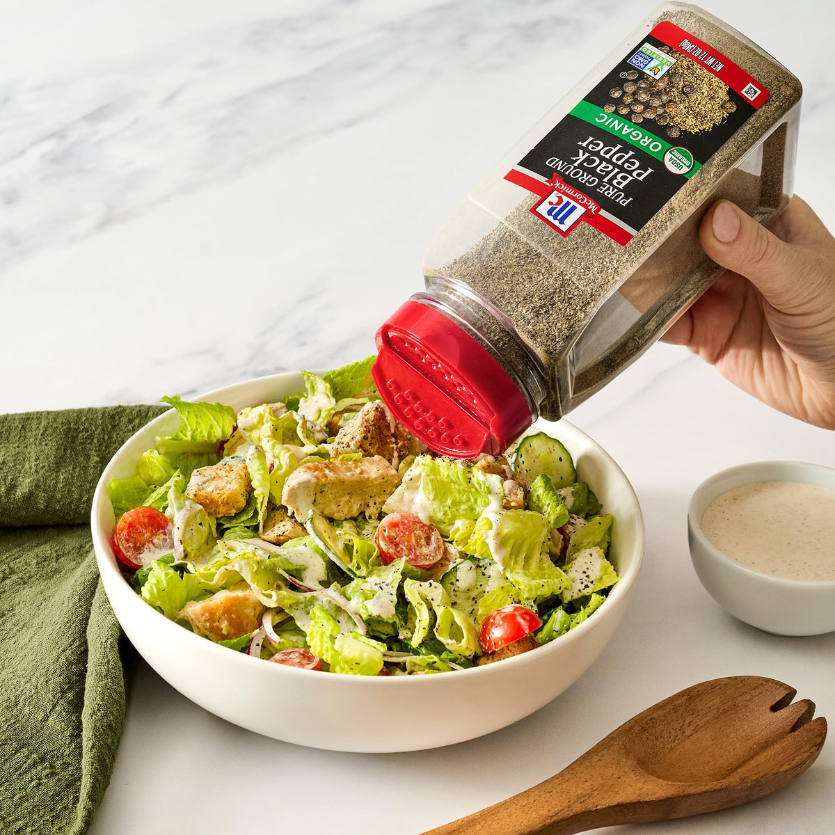 Meat rub with pepper suggests pre-cook seasoning for savory dishes