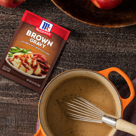 McCormick Brown Gravy Mix simmering to enhance beef stew