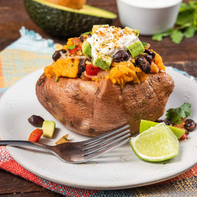 McCormick Classic Taco Seasoning Mild in pan as meat sizzles with seasoning