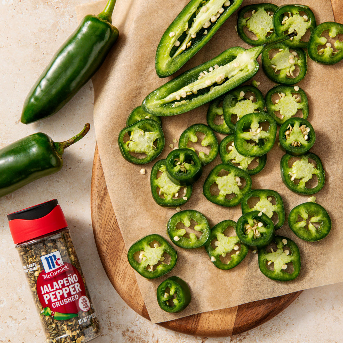 McCormick Crushed Jalapeno Pepper elotes on corn with vibrant heat.