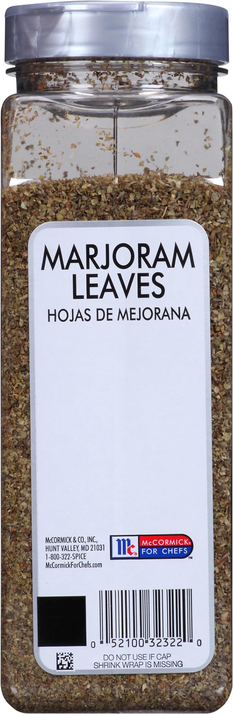 Pantry jar of McCormick Culinary Marjoram Leaves on a kitchen shelf.