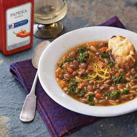 McCormick Culinary Paprika sprinkled over a dish for color.