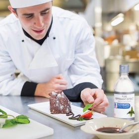 McCormick Culinary Peppermint Extract glass bottle ready for measurement and recipes.
