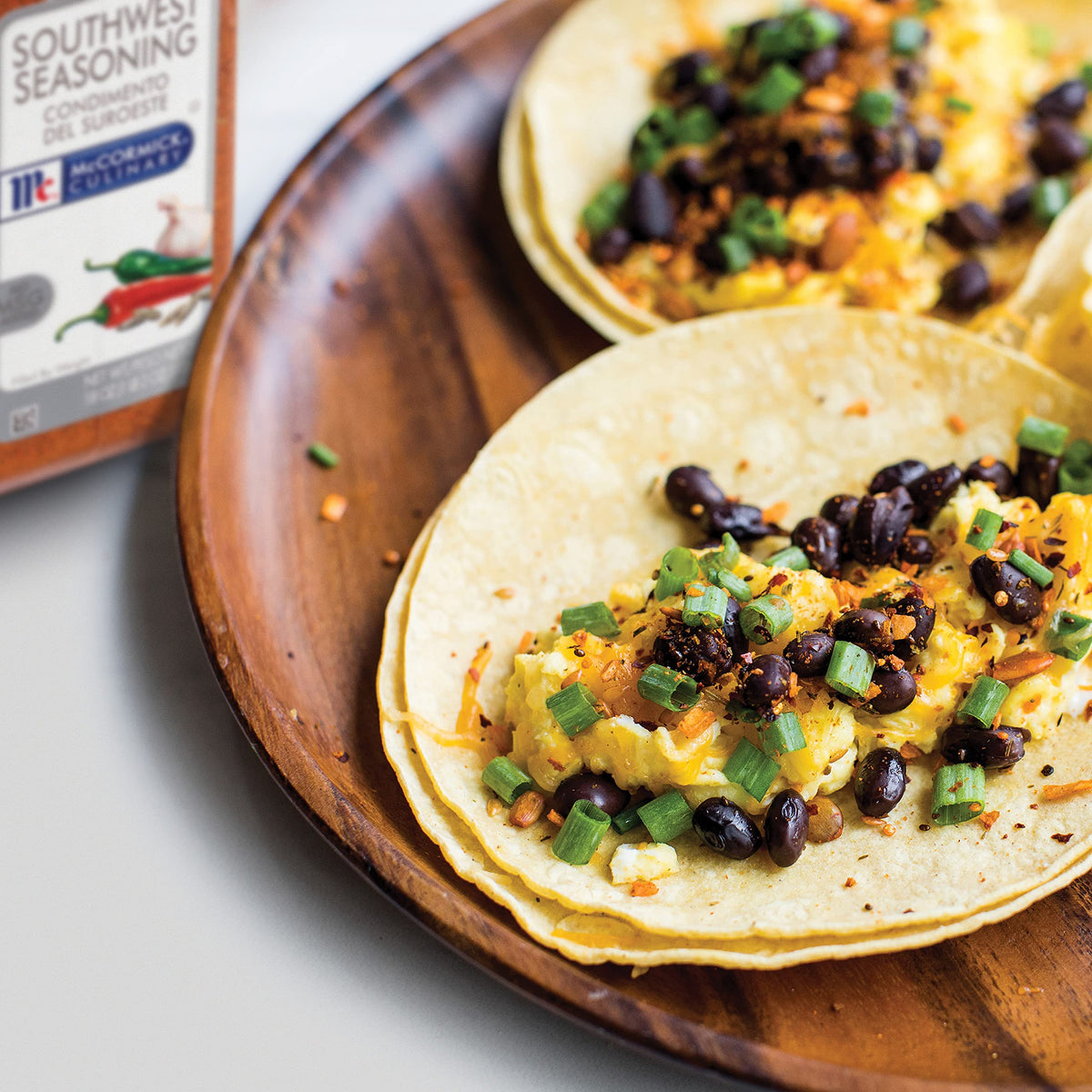 Container on shelf suggests ready-to-use, chef-friendly spice for quick Tex-Mex prep.