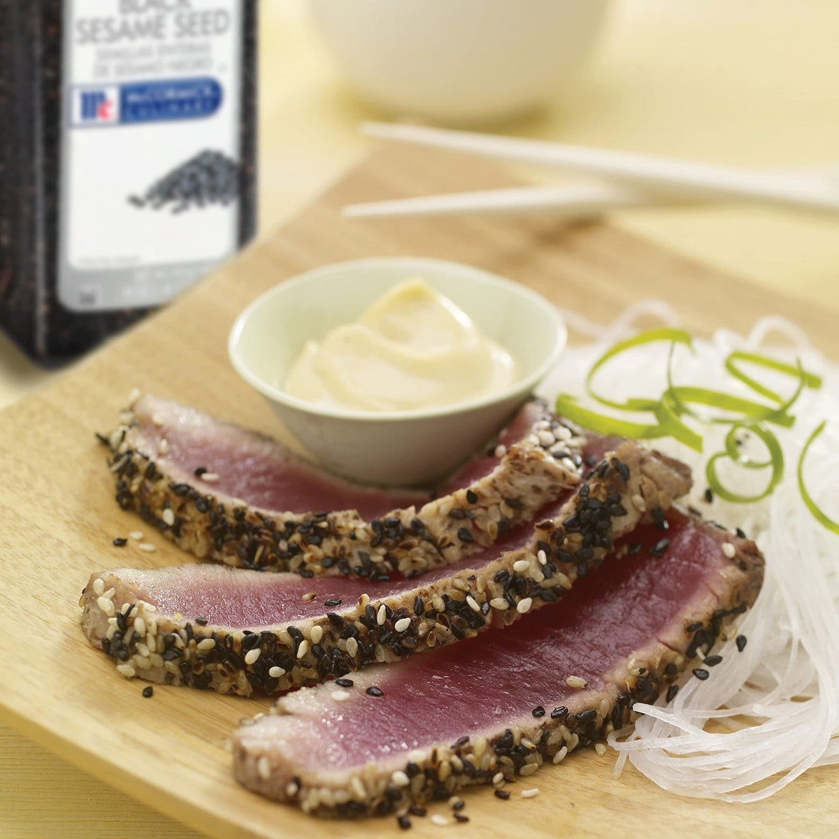 Stir-fries topped with McCormick Culinary black sesame seeds for color.