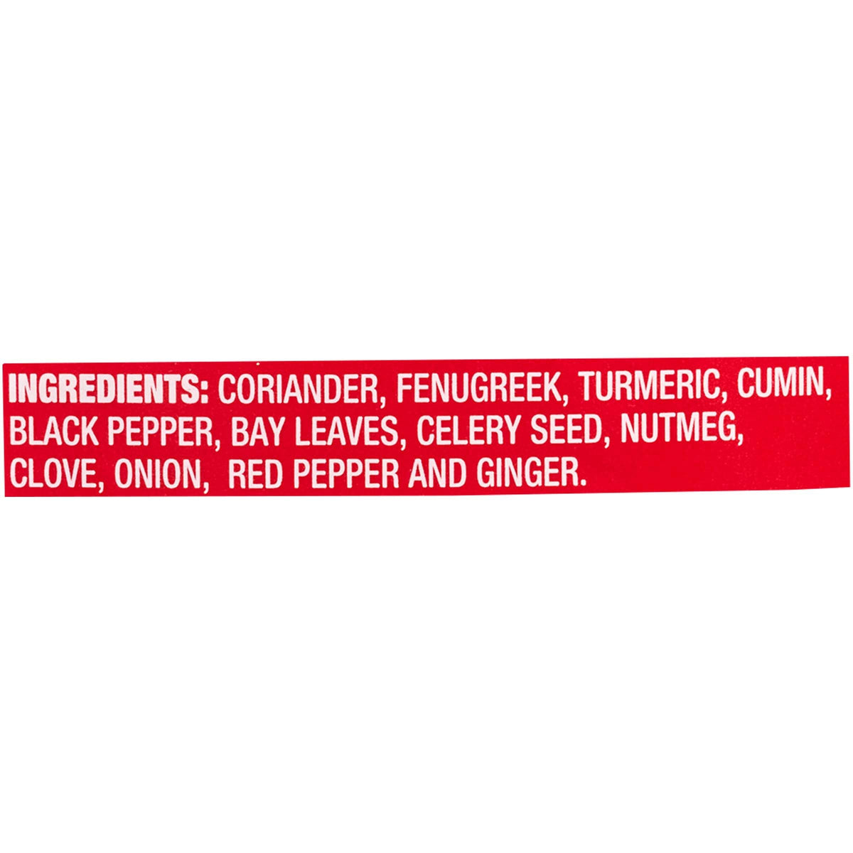 McCormick Curry Powder bottle angled in kitchen, versatile seasoning for meats and vegetables.
