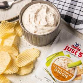 Dipping shot with McCormick seasoning shows easy, mess-free application