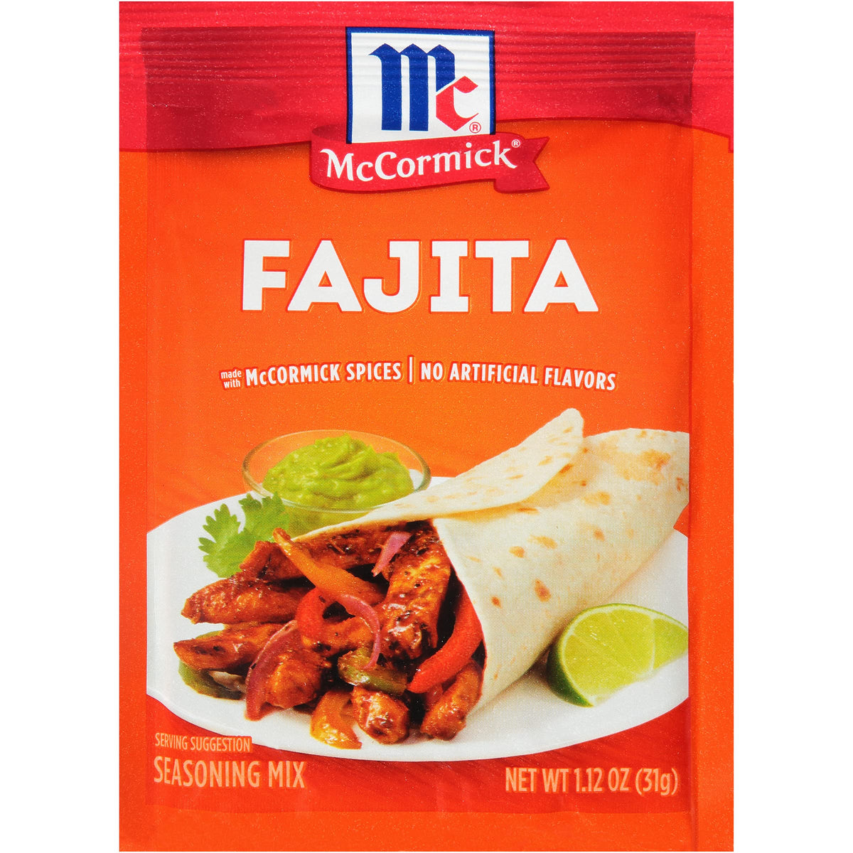Sprinkling McCormick Fajita Seasoning Mix on sizzling steak for fajitas.