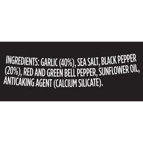 McCormick Garlic Pepper Grinder ready by grill for fresh flavor.
